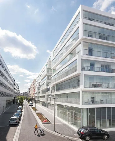 Un empilement de boîtes en béton qui doit sa légèreté aux façades entièrement vitrées. Un empilement de boîtes en béton qui doit sa légèreté aux façades entièrement vitrées.